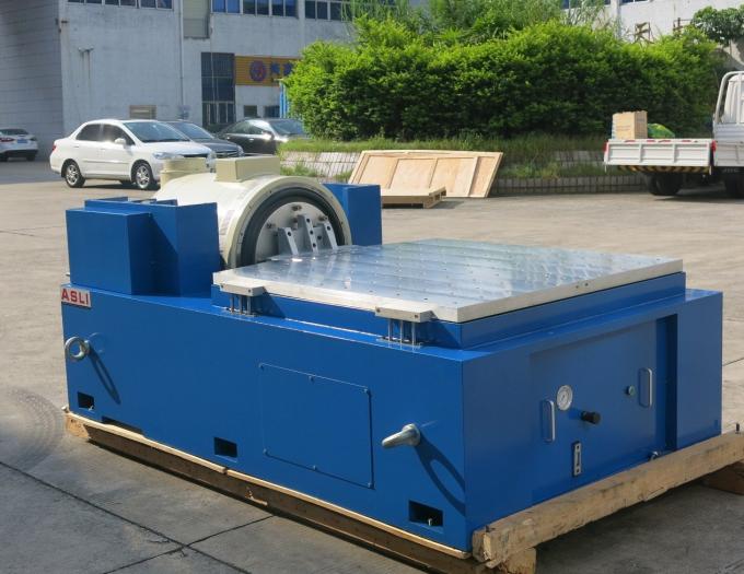 High frequency random vibration testing equipment — side view showing control cabinet and vibration table